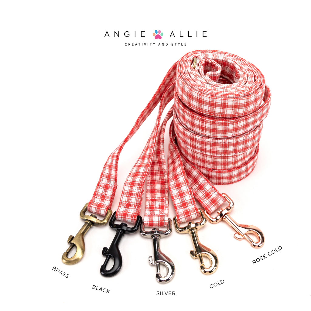 100% Cotton Adjustable Dog Leash Gingham Orange with brass, black, silver, gold, rose gold hardware on a white background, featuring the Angie Allie brand